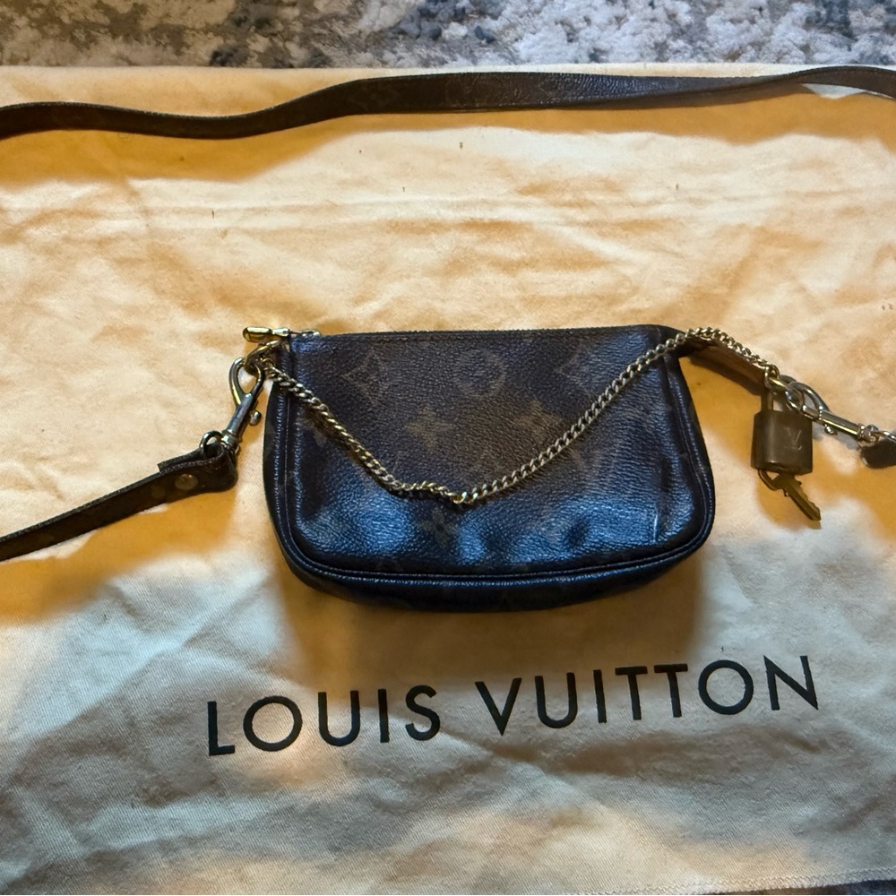 Louis Vuitton authentic bag with lock and key